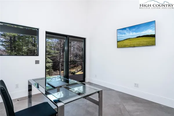 a kitchen with a stove and a refrigerator