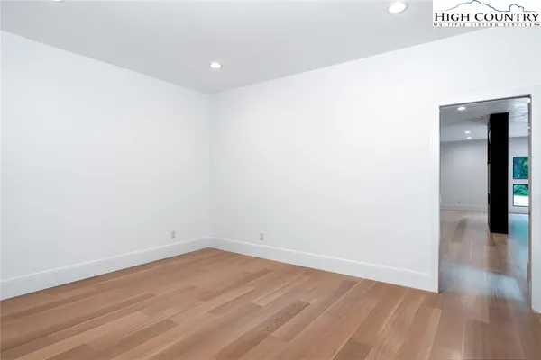 a bathroom with a sink toilet and mirror
