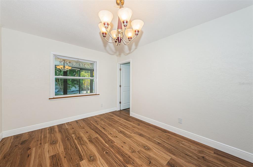 4723 114th Street North Madeira Beach, FL 33708 - Photo 21 of 41 a view of a chandelier in a room