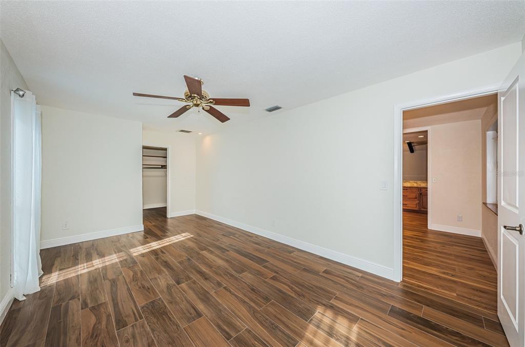 4723 114th Street North Madeira Beach, FL 33708 - Photo 24 of 41 a view of empty room with wooden floor