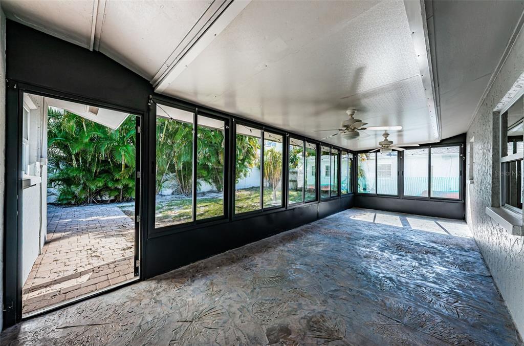 4723 114th Street North Madeira Beach, FL 33708 - Photo 35 of 41 a view of an empty room with a balcony