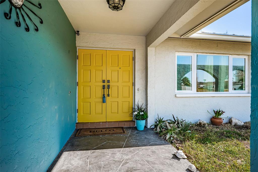 4723 114th Street North Madeira Beach, FL 33708 - Photo 4 of 41 a view of front door of house