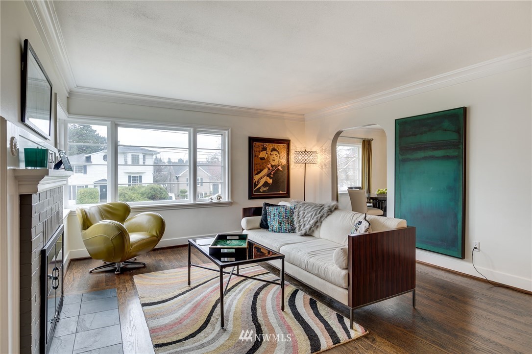 2565 35th Avenue West Seattle, WA 98199 - Photo 3 of 36 a living room with furniture and a large window
