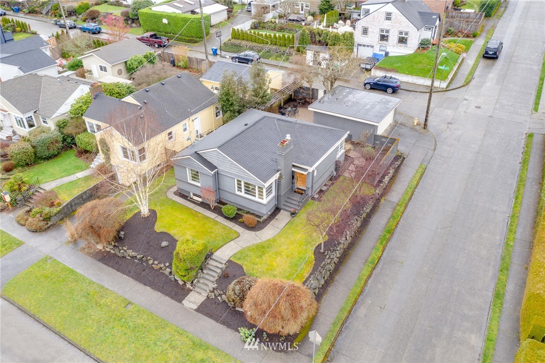 2565 35th Avenue West Seattle, WA 98199 - Photo 32 of 36 an aerial view of a house with a swimming pool