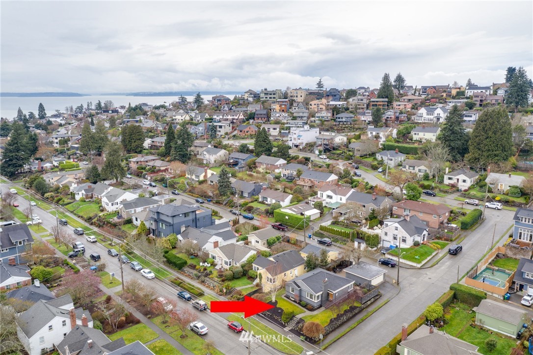 2565 35th Avenue West Seattle, WA 98199 - Photo 35 of 36 an aerial view of residential houses with outdoor space