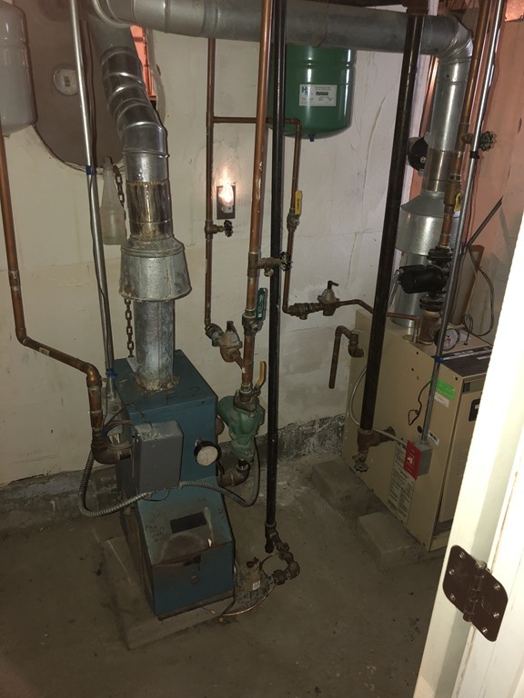 16 Prospect Court Lawrence, MA 01841 - Photo 14 of 14 a room with gym equipment