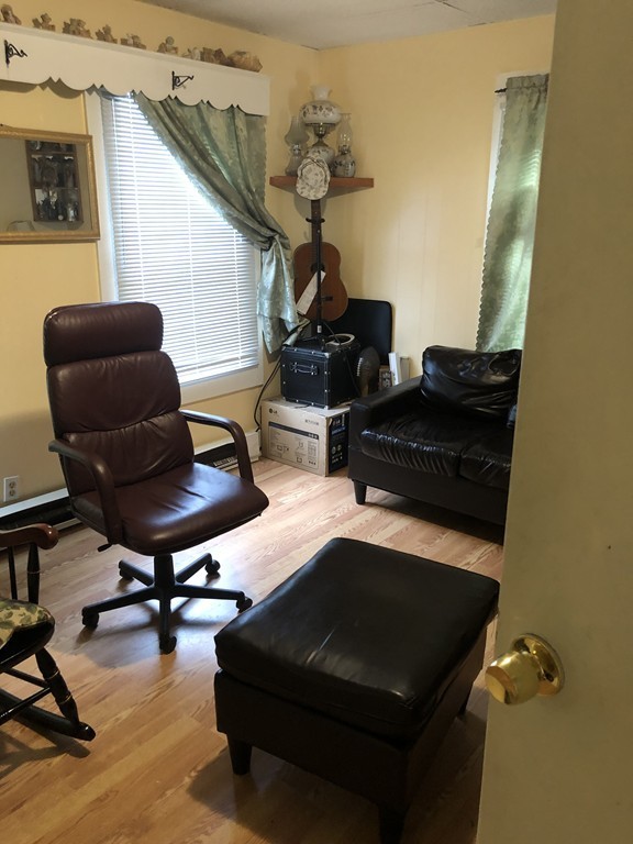 16 Prospect Court Lawrence, MA 01841 - Photo 7 of 14 a living room with furniture and wooden floor