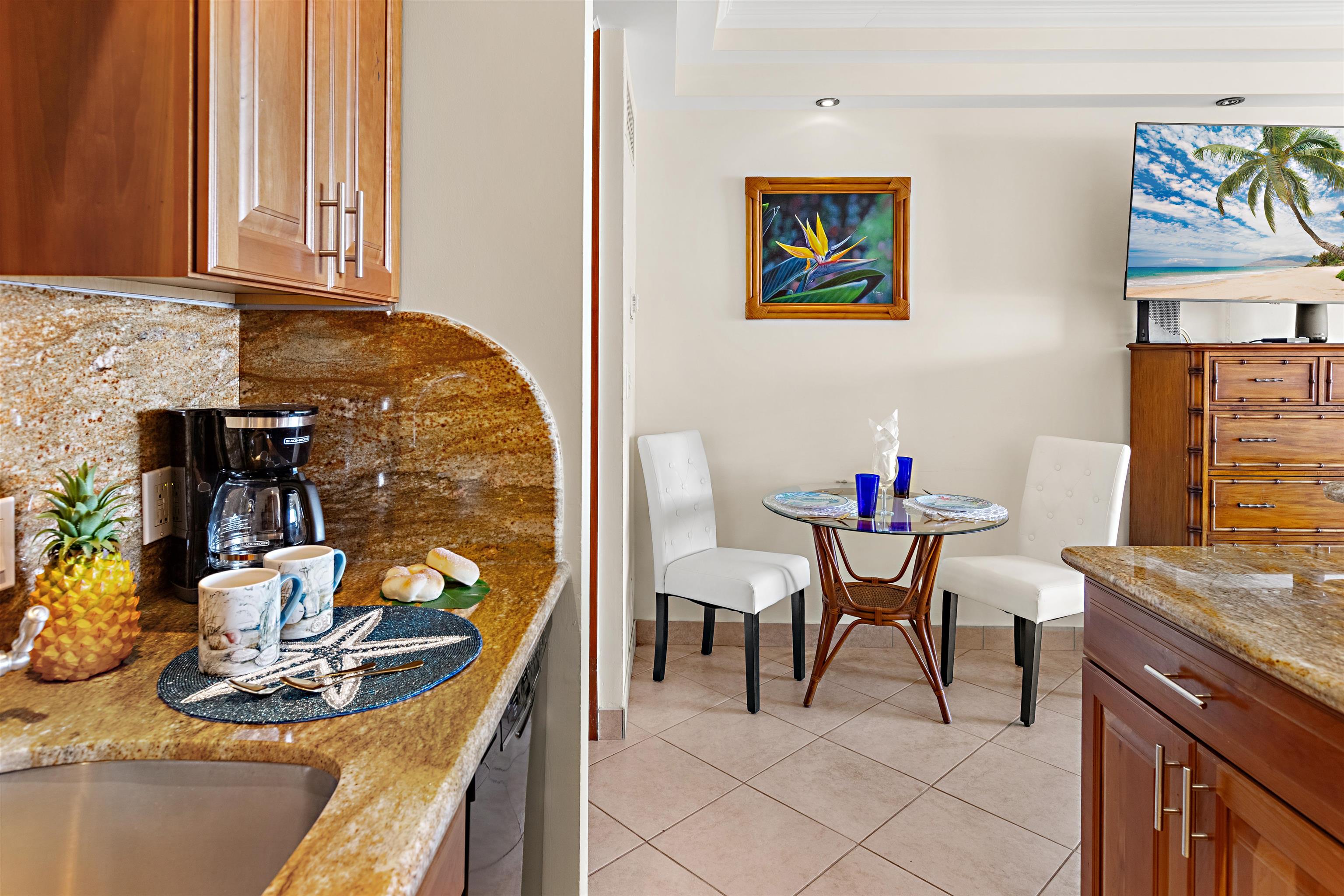 475 Front Street, Unit 635 Lahaina, HI 96761 - Photo 11 of 23 a view of a dining room with furniture