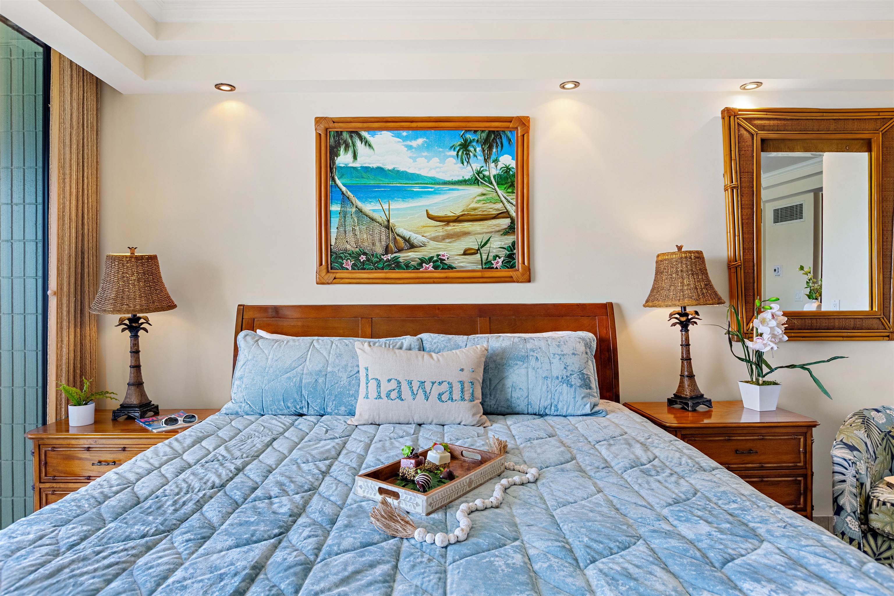 475 Front Street, Unit 635 Lahaina, HI 96761 - Photo 21 of 23 a bedroom with a bed and wooden floor