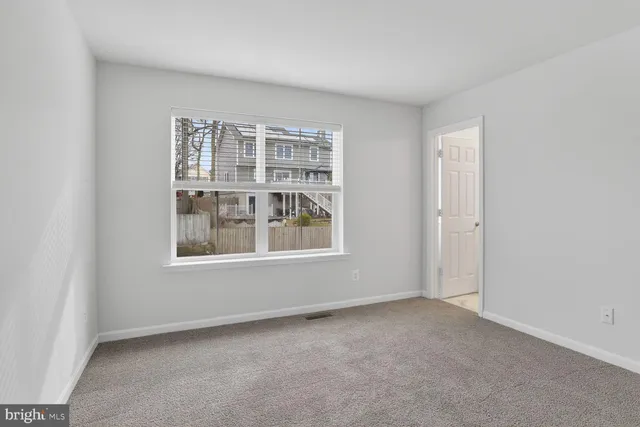 a view of kitchen with wooden floor