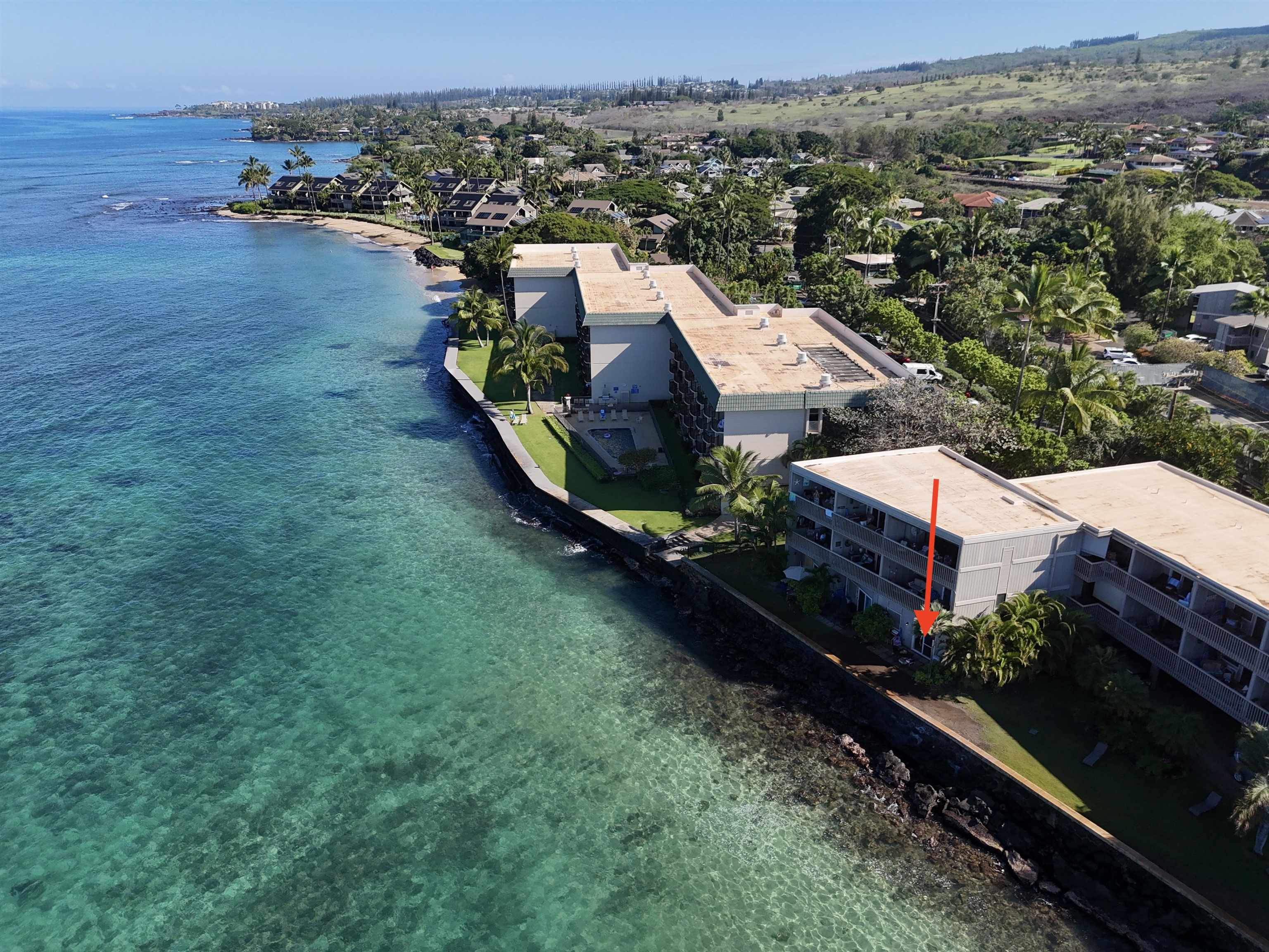 4435 Lower Honoapiilani Road, Unit 103 Lahaina, HI 96761 - Photo 26 of 34 an aerial view of a house with garden space and lake view