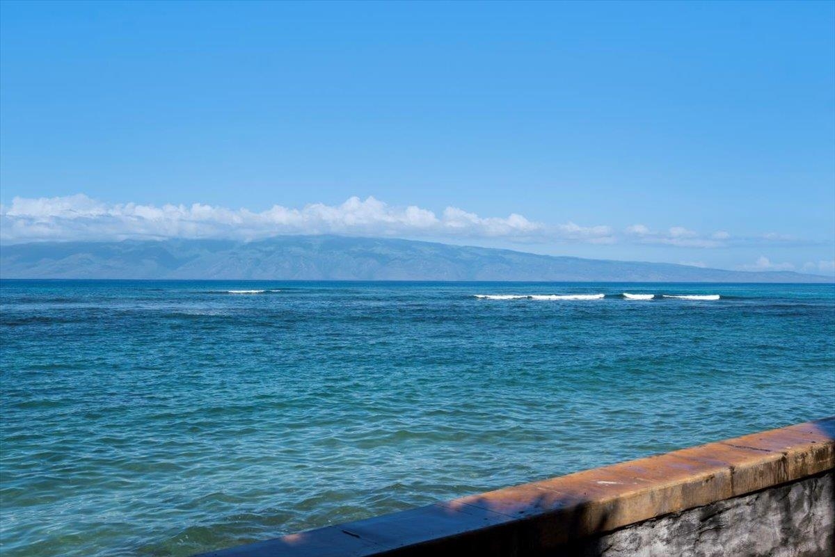 4435 Lower Honoapiilani Road, Unit 103 Lahaina, HI 96761 - Photo 9 of 34 a view of an ocean from a balcony
