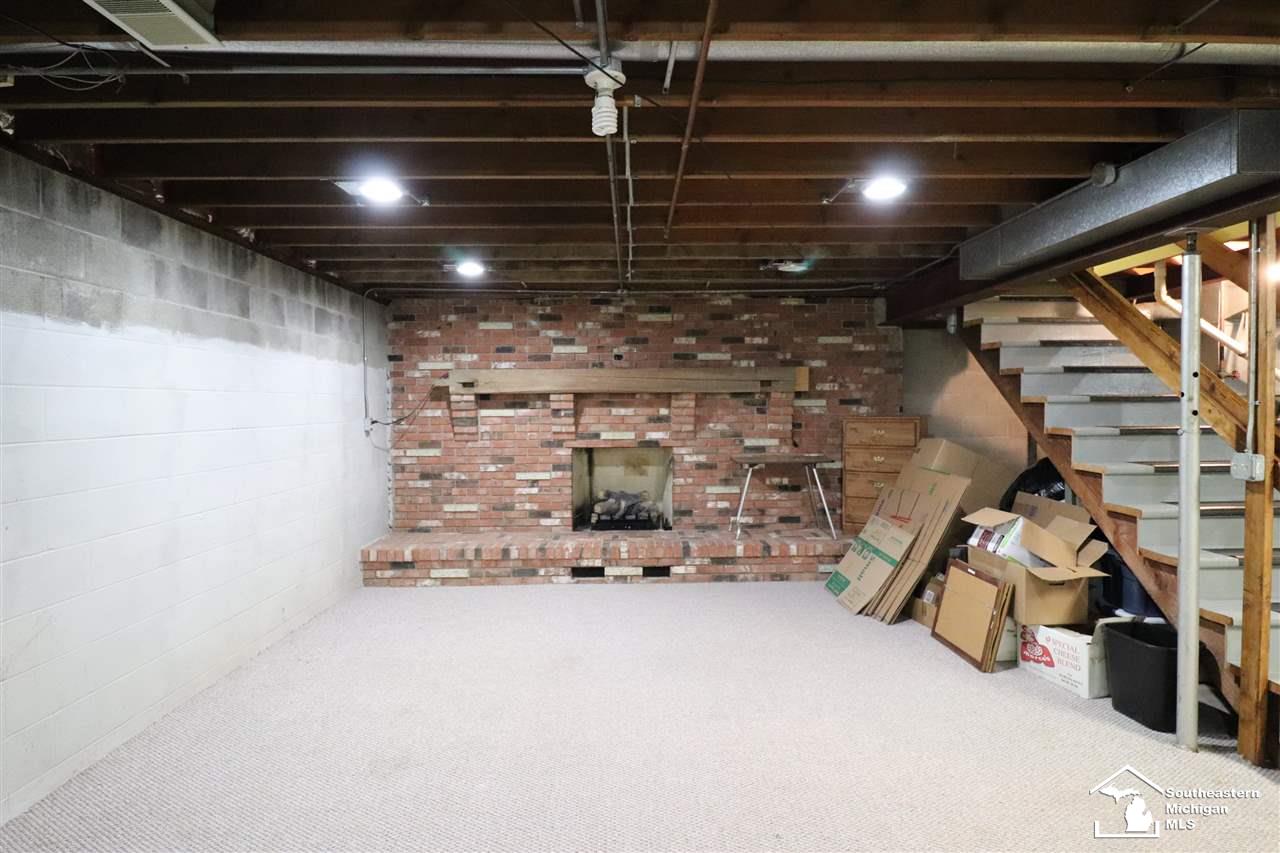 7875 Adler Road Lambertville, MI 48144 - Photo 19 of 21 Fireplace in basement