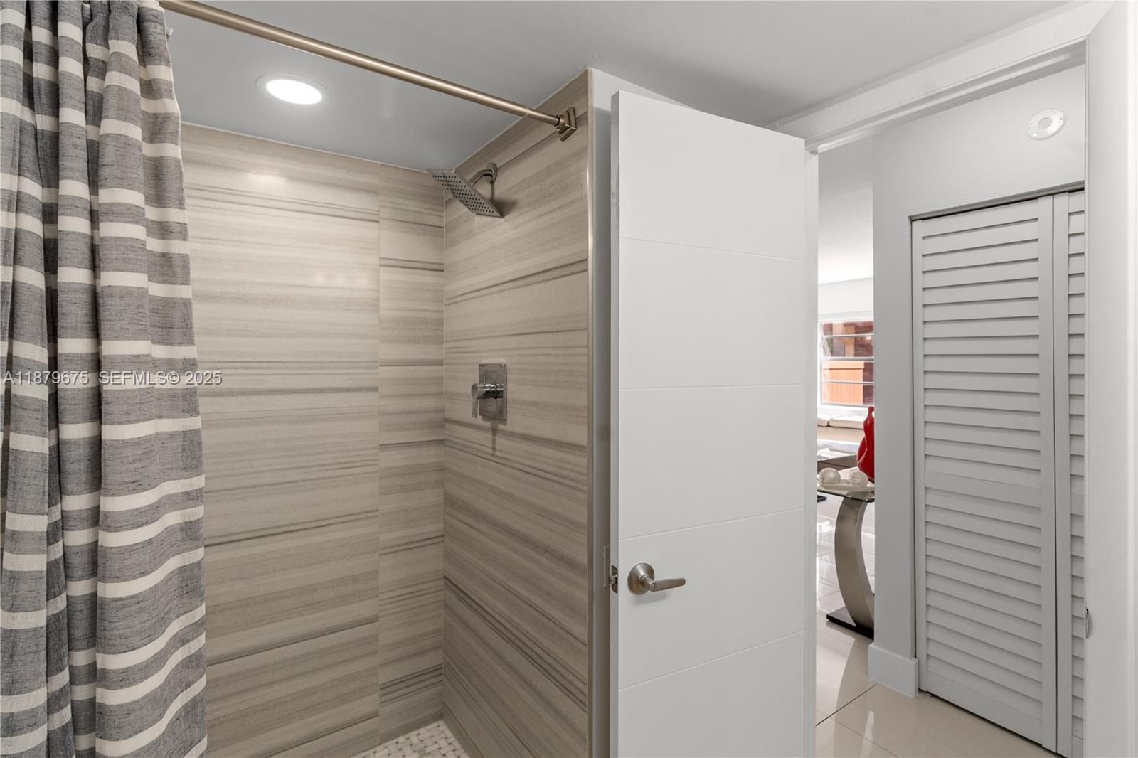 6621 Southwest 116th Place, Unit B2 Miami, FL 33173 - Photo 16 of 36 a bathroom with a shower