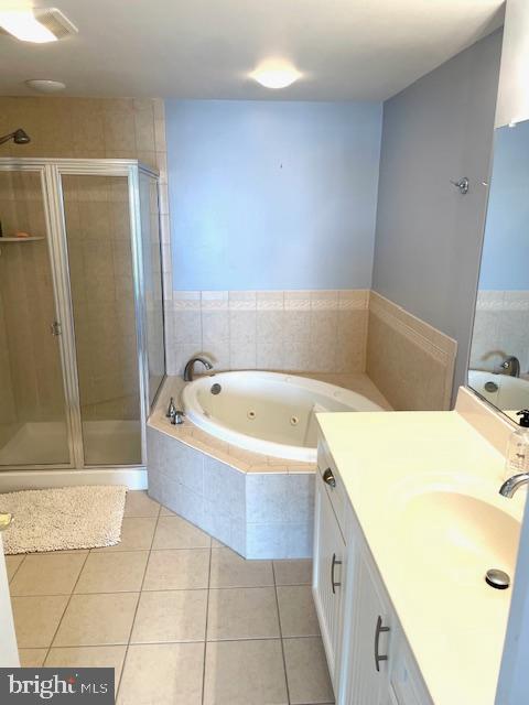 103 Williams Street, Unit 213 Crisfield, MD 21817 - Photo 20 of 25 a bathroom with a tub sink and shower
