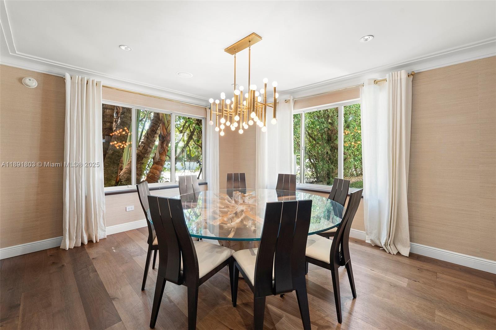 2701 North Bay Road Miami Beach, FL 33140 - Photo 12 of 38 a view of a dining room with furniture window and outside view