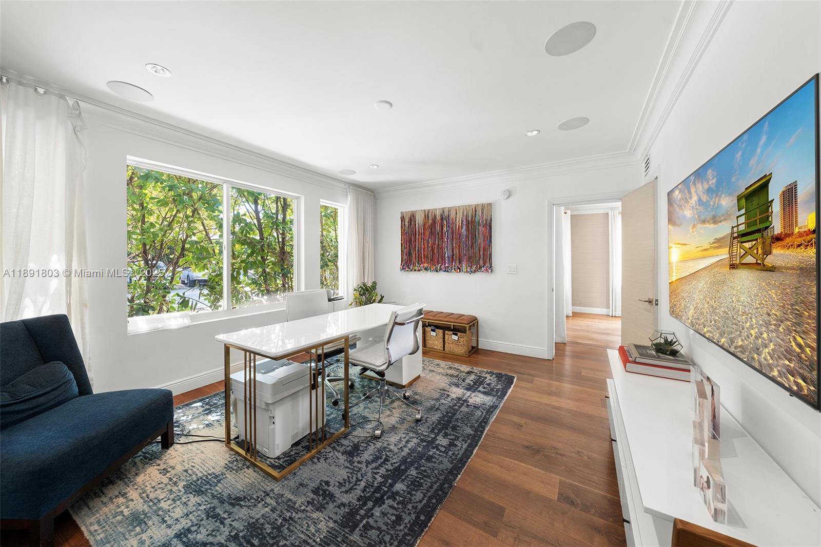 2701 North Bay Road Miami Beach, FL 33140 - Photo 14 of 38 a living room with furniture and a flat screen tv