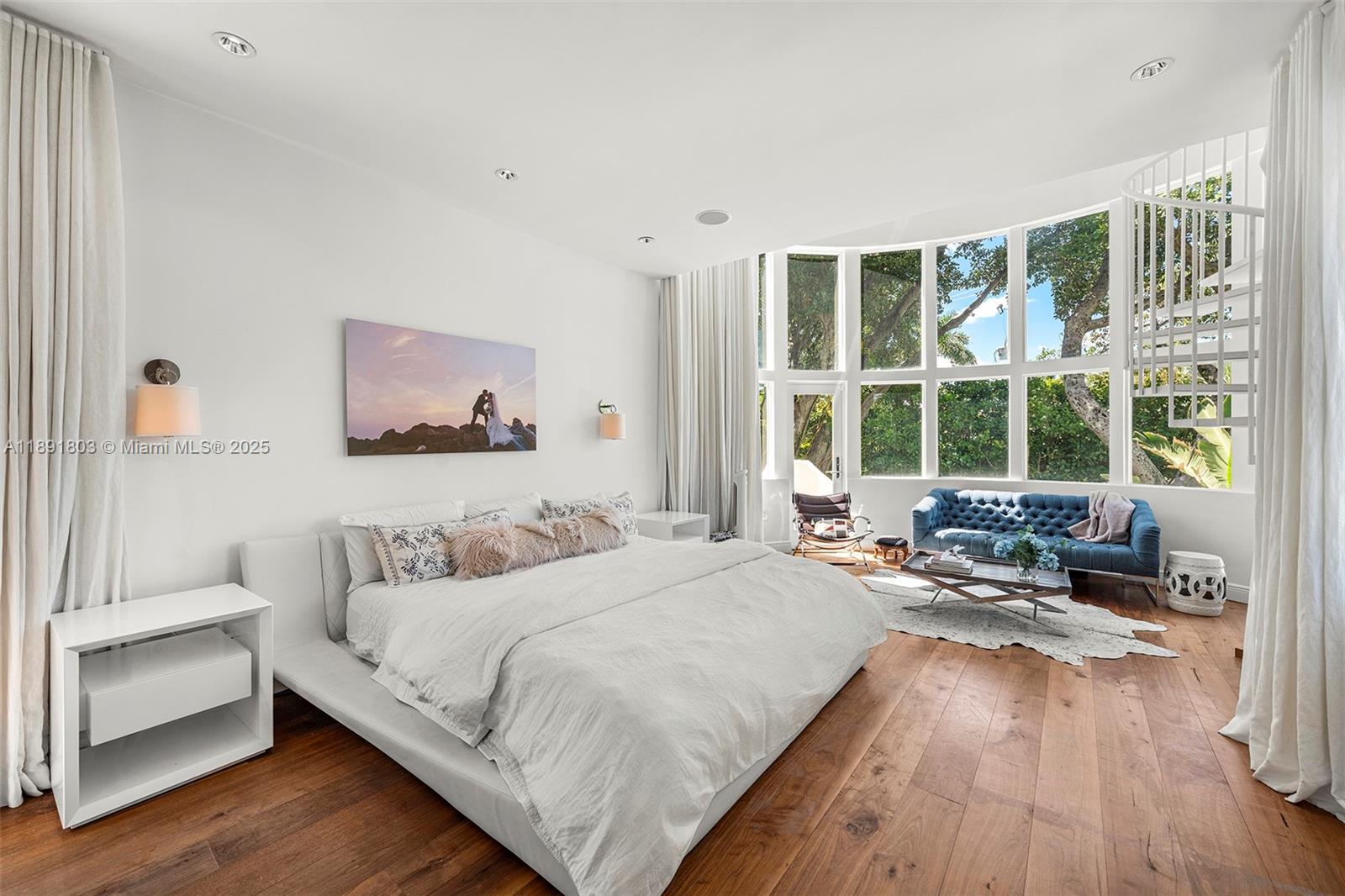 2701 North Bay Road Miami Beach, FL 33140 - Photo 20 of 38 a bedroom with a bed and a large window