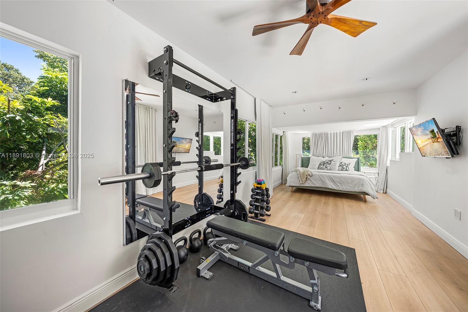 2701 North Bay Road Miami Beach, FL 33140 - Photo 32 of 38 a view of a room with gym equipment