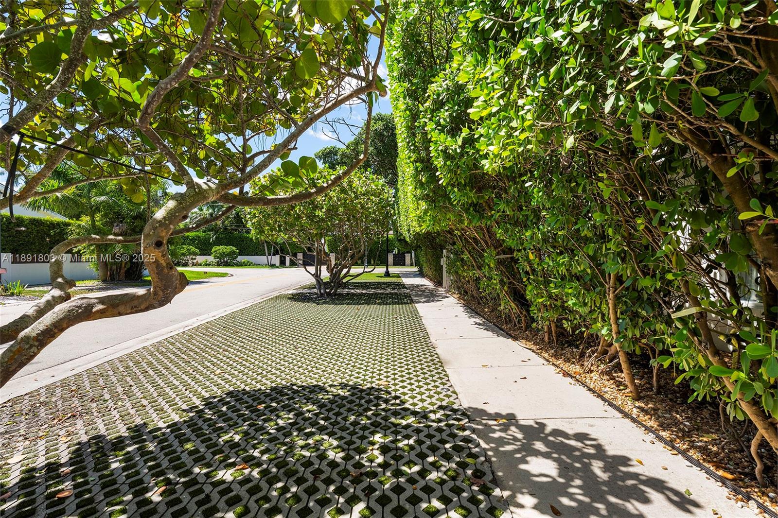 2701 North Bay Road Miami Beach, FL 33140 - Photo 38 of 38 a view of a pathway both side of building