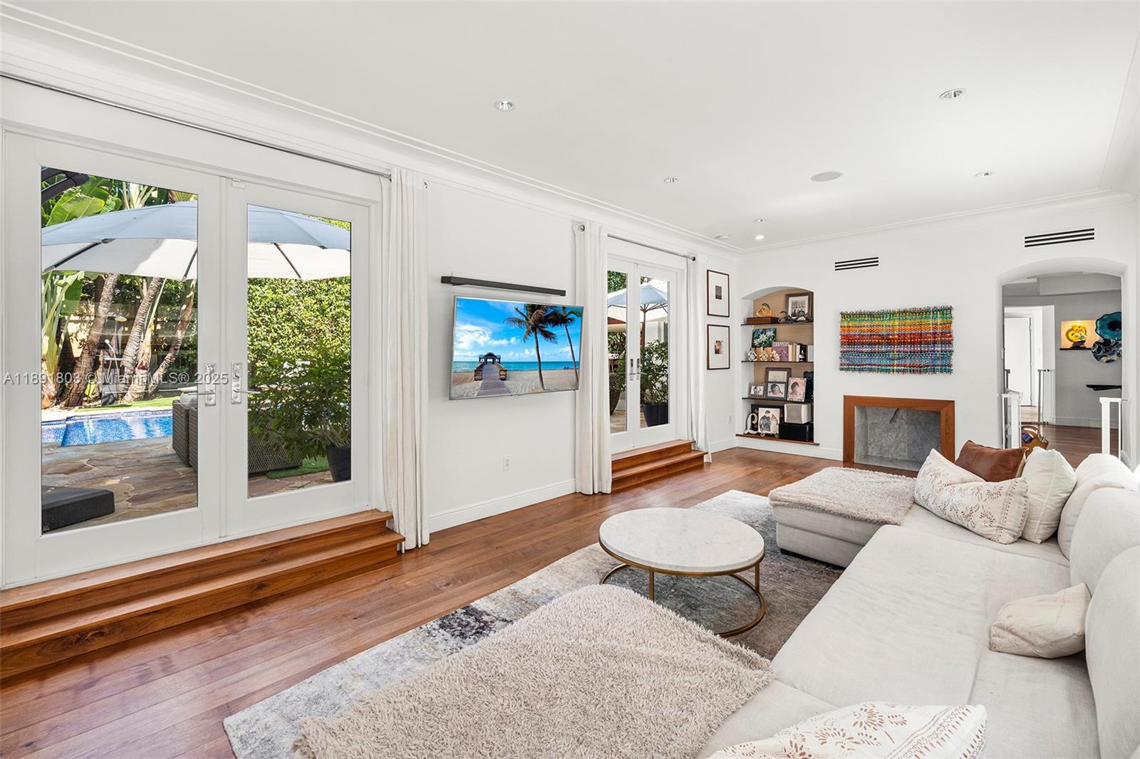 2701 North Bay Road Miami Beach, FL 33140 - Photo 8 of 38 a living room with furniture and a rug