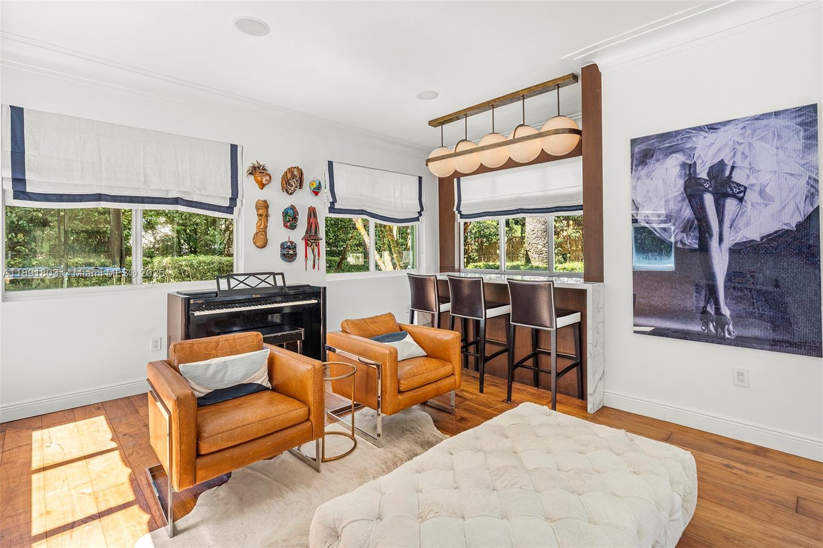 2701 North Bay Road Miami Beach, FL 33140 - Photo 10 of 38 a bedroom with furniture and a large window