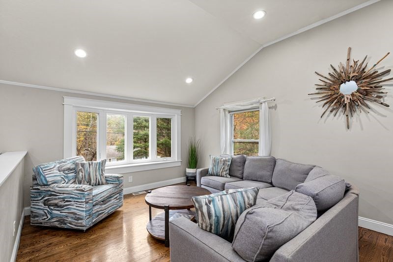 242 Hedges Pond Road Plymouth, MA 02360 - Photo 11 of 38 a living room with furniture and a large window
