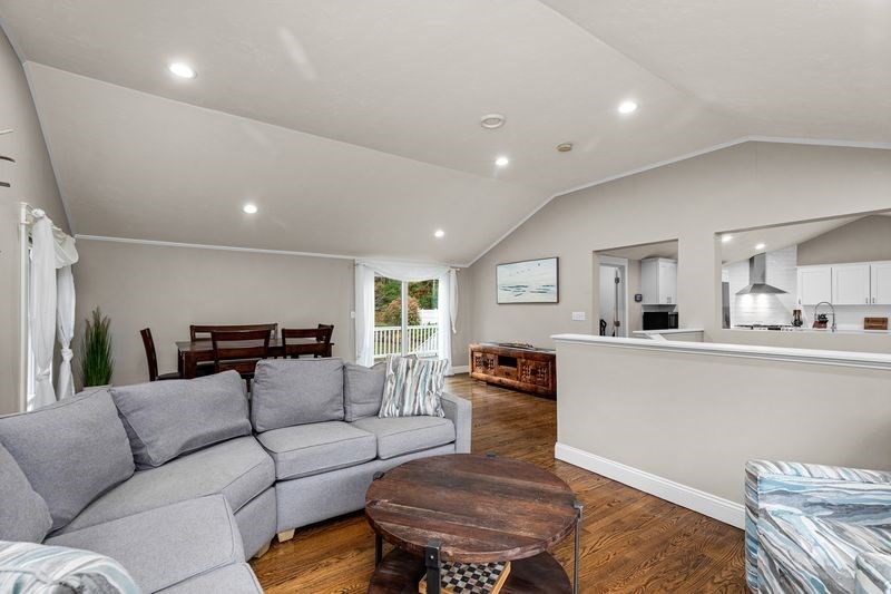 242 Hedges Pond Road Plymouth, MA 02360 - Photo 12 of 38 a living room with furniture and a wooden floor
