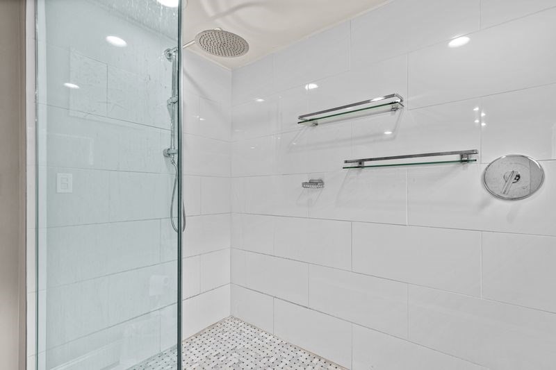 242 Hedges Pond Road Plymouth, MA 02360 - Photo 20 of 38 a bathroom with a shower and a mirror