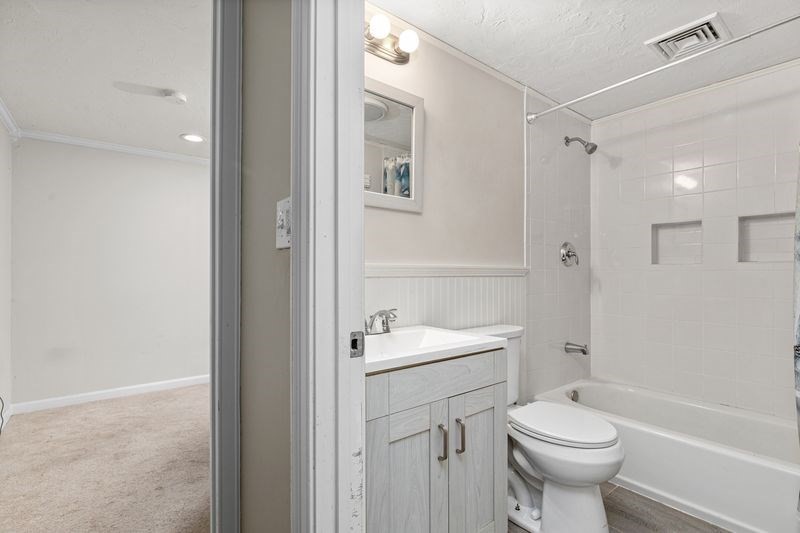 242 Hedges Pond Road Plymouth, MA 02360 - Photo 23 of 38 a bathroom with a sink toilet and shower