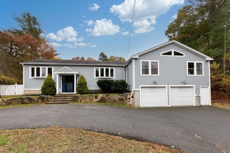 242 Hedges Pond Road Plymouth, MA 02360 - Photo 28 of 38 a view of a house with a yard
