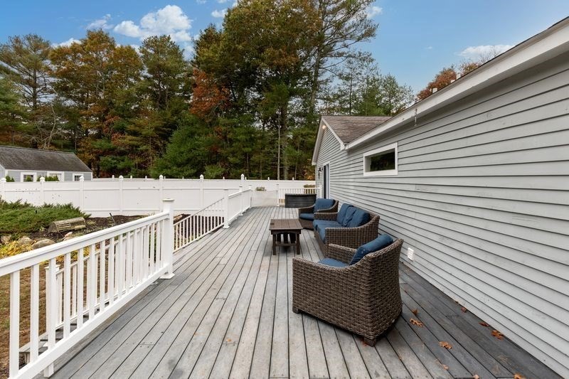 242 Hedges Pond Road Plymouth, MA 02360 - Photo 29 of 38 a balcony with wooden floor and furniture