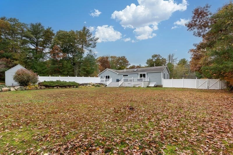 242 Hedges Pond Road Plymouth, MA 02360 - Photo 30 of 38 a white house covered with tall trees