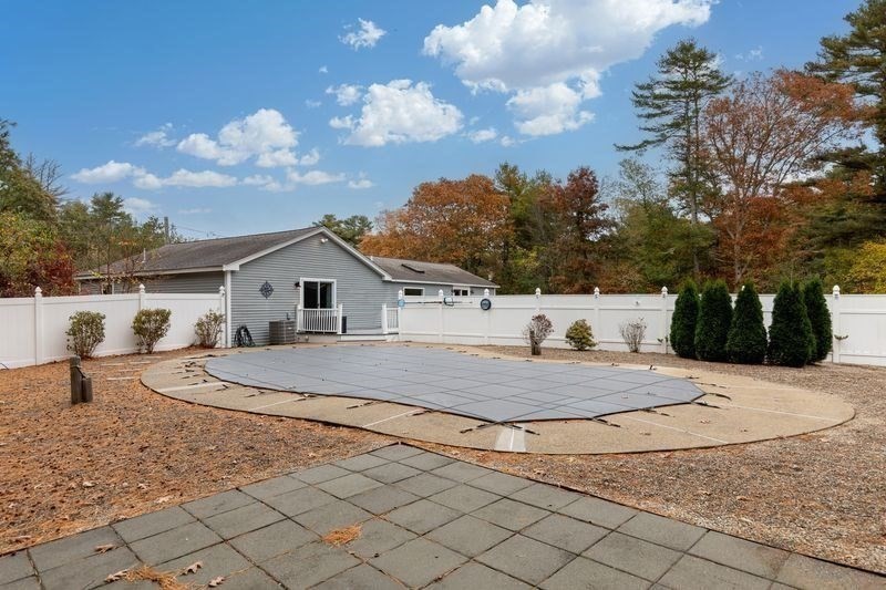 242 Hedges Pond Road Plymouth, MA 02360 - Photo 33 of 38 a view of white house with a yard and large tree