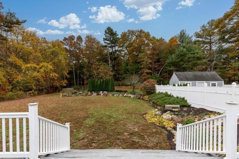 242 Hedges Pond Road Plymouth, MA 02360 - Photo 35 of 38 a white house that has tree in front of it
