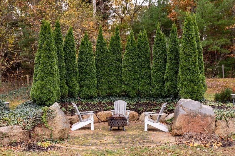 242 Hedges Pond Road Plymouth, MA 02360 - Photo 37 of 38 a view of a patio with furniture