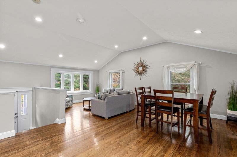 242 Hedges Pond Road Plymouth, MA 02360 - Photo 9 of 38 a view of a dining room with furniture window and wooden floor