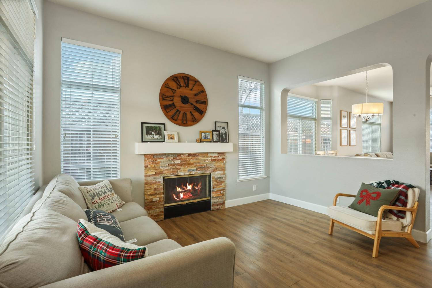 277 Fragrance Street Manteca, CA 95337 - Photo 13 of 27 a living room with furniture and a fireplace