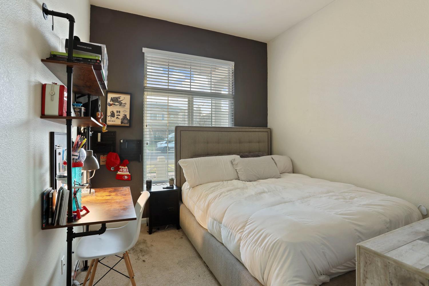277 Fragrance Street Manteca, CA 95337 - Photo 21 of 27 a bedroom with a bed and a window
