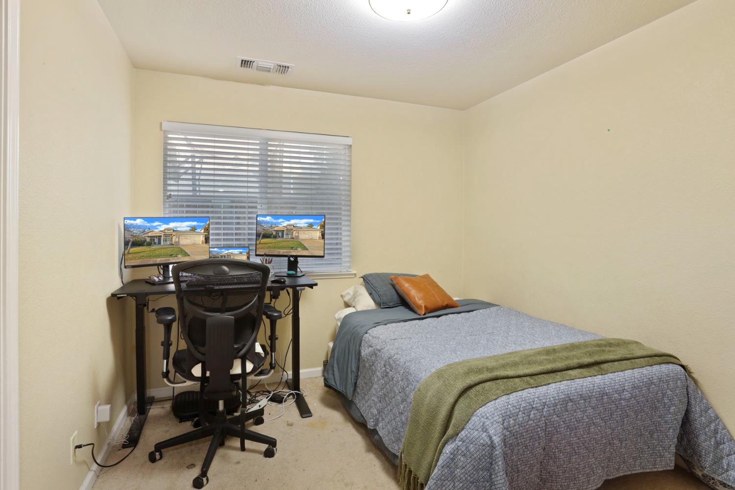 277 Fragrance Street Manteca, CA 95337 - Photo 23 of 27 a view of a workspace with furniture and a window