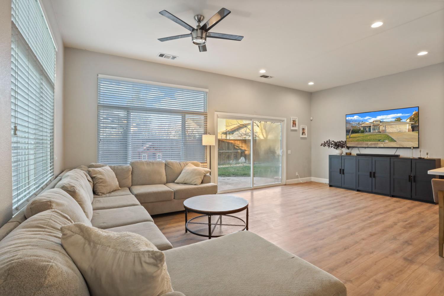 277 Fragrance Street Manteca, CA 95337 - Photo 8 of 27 a living room with furniture and a large window