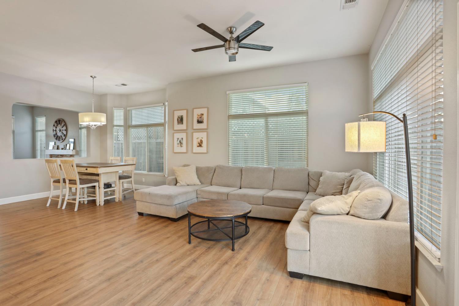 277 Fragrance Street Manteca, CA 95337 - Photo 10 of 27 a living room with furniture and wooden floor