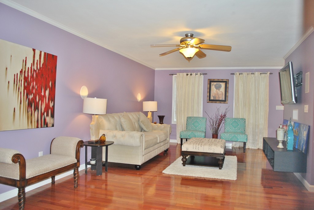 4 Marsh Road Hudson, NH 03051 - Photo 3 of 22 a living room with furniture and wooden floor