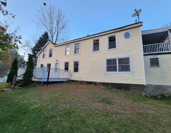 36 Brookfield Road Sturbridge, MA 01518 - Photo 1 of 9 a view of a house with a backyard