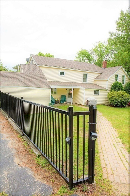 36 Brookfield Road Sturbridge, MA 01518 - Photo 2 of 9 a view of a balcony with an outdoor space