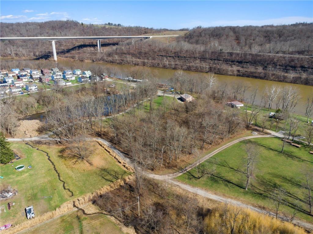 100 Pond Street Denbo, PA 15417 - Photo 20 of 25 a view of a lake in middle of the town