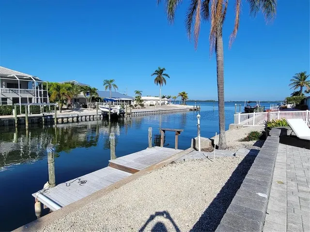 a view of a lake with couches