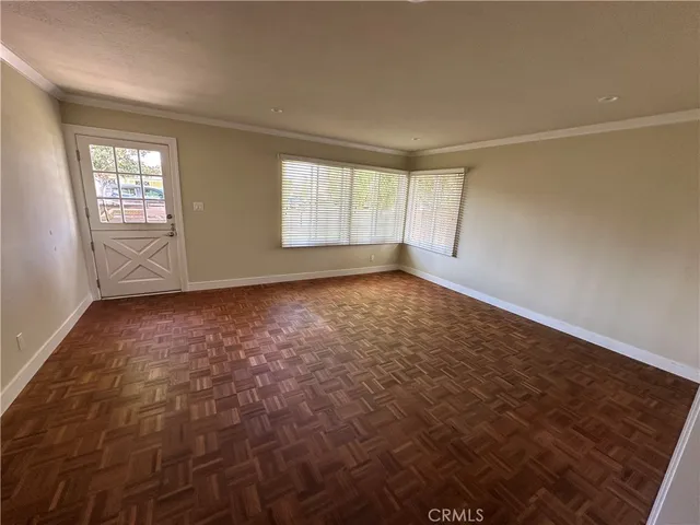 an empty room with windows