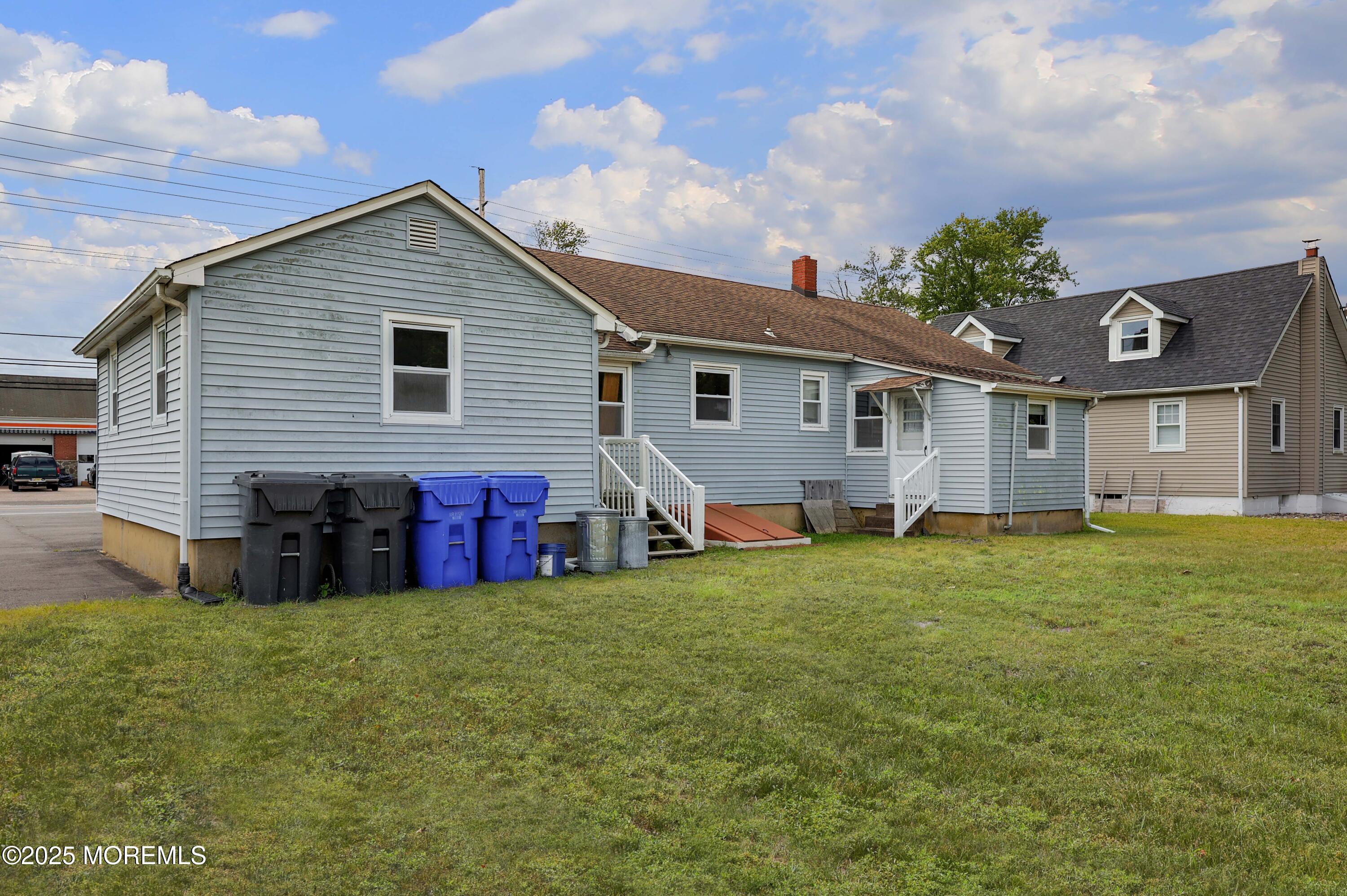 230 Drum Point Road Brick, NJ 08723 - Photo 11 of 31 a view of a house with a yard