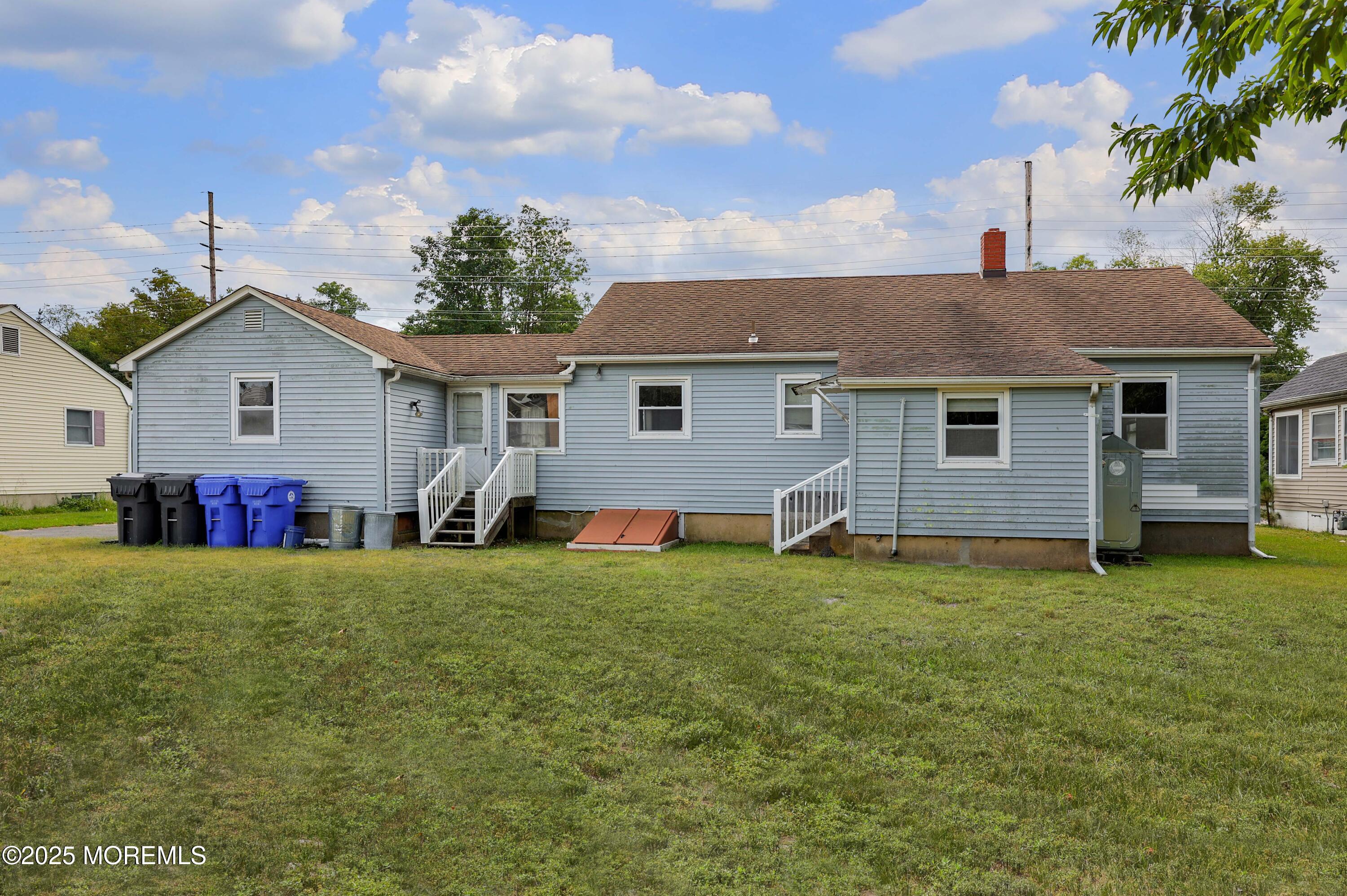 230 Drum Point Road Brick, NJ 08723 - Photo 13 of 31 a view of a house with a yard